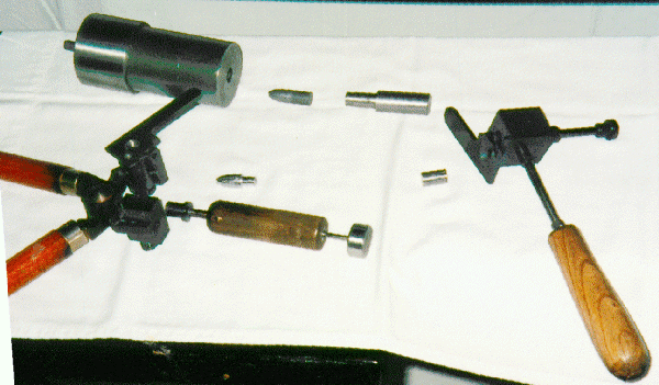 Swage block and bullet molds for two piece slug gun bullet.