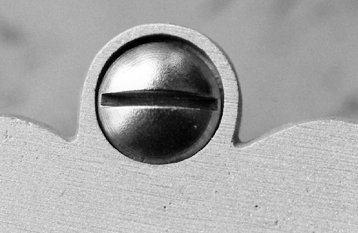 The countersunk recess for the head of the lock bolt will conceal small mistakes in lining up a true 90 degrees between plate and hole.