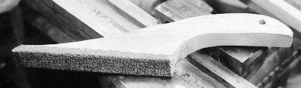 Fig. 6b. You can custom-fashion a sanding block for a specific area in a few minutes using scrap wood around the shop.